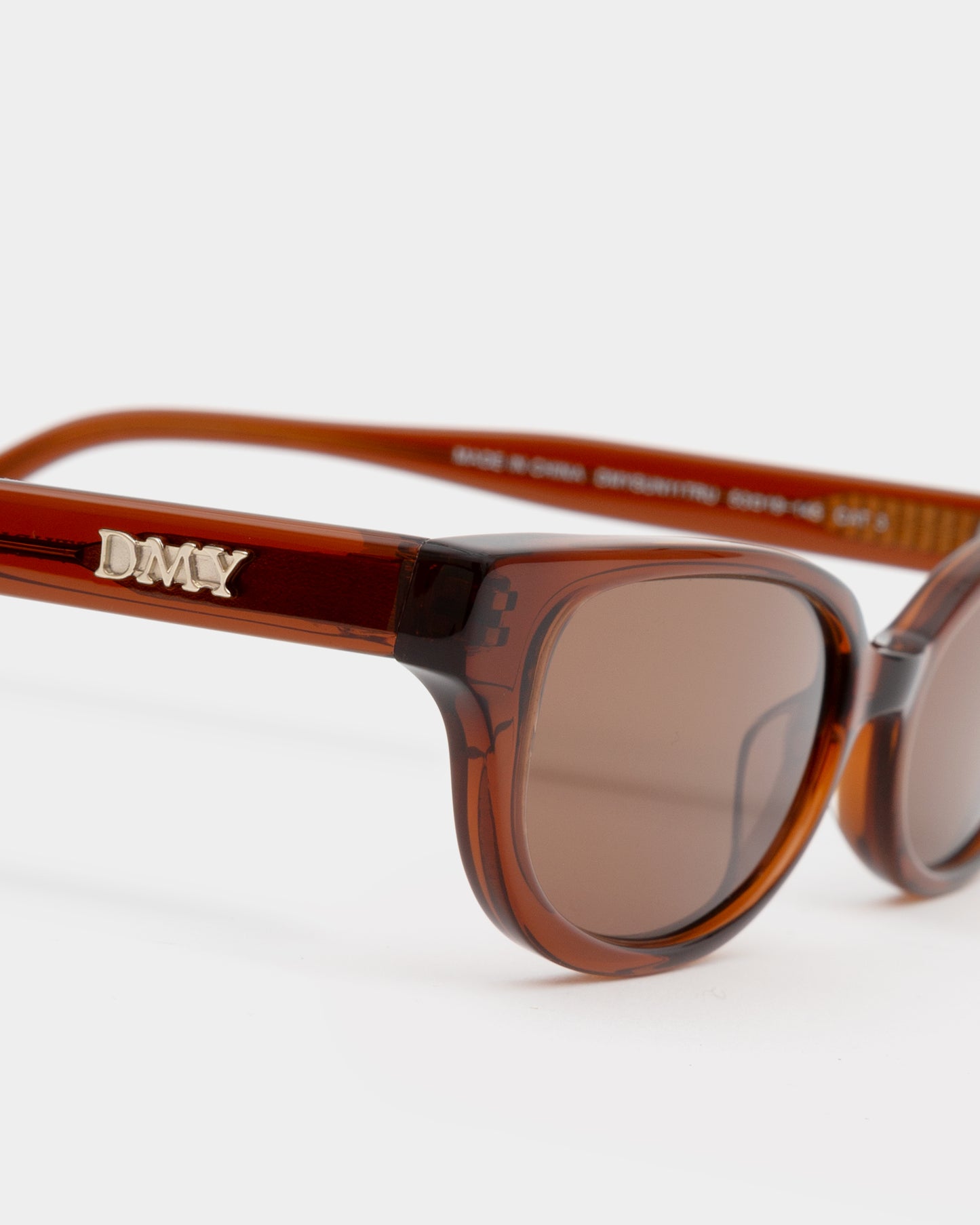 Romi Transparent Rust Sunglasses
